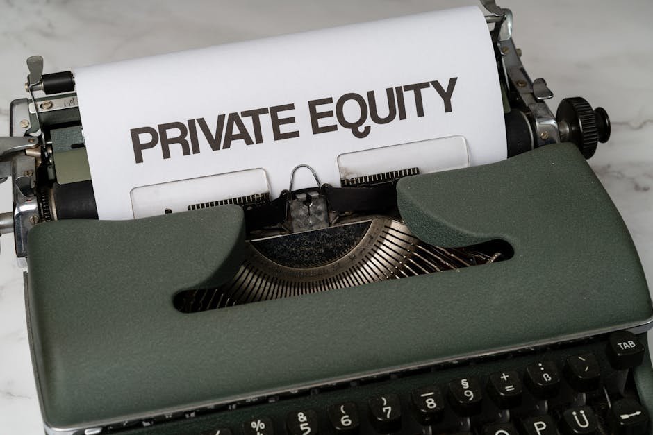 Close-up of vintage typewriter with 'PRIVATE EQUITY' on paper, business concept.